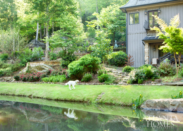 After dynamiting the backyard, the homeowners built layers of beds and gardens throughout the property.
