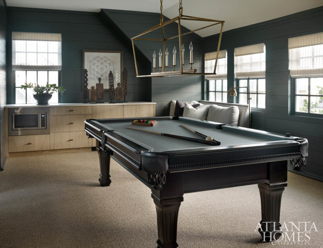 The top floor features a sophisticated rec area that’s ideal for entertaining