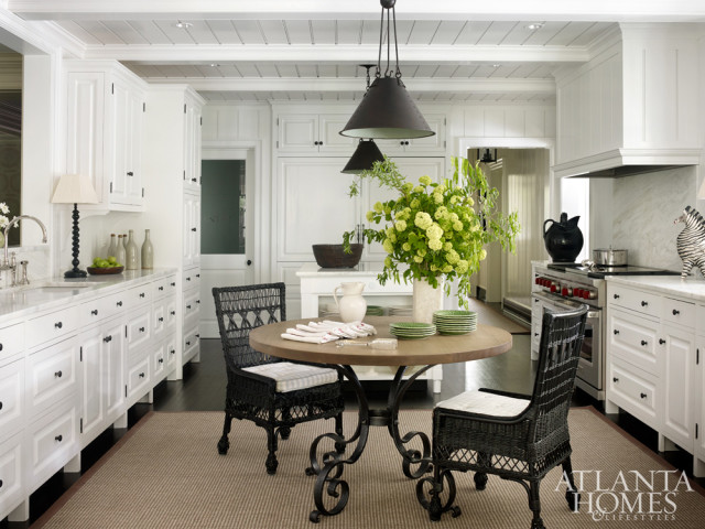 The bright kitchen, while generous, was actually reduced in size and relocated to carve out additional space for a laundry room, half bath and pantry.