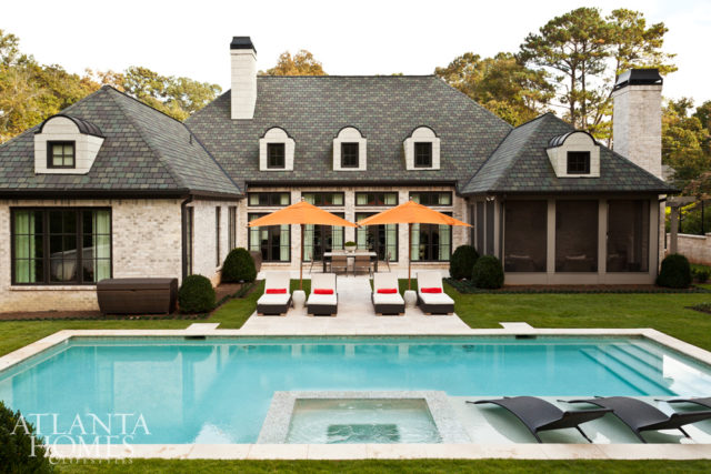 The homeowner enlisted Land Plus to transform the backyard into an entertaining space. The lounge furniture is from Restoration Hardware.
