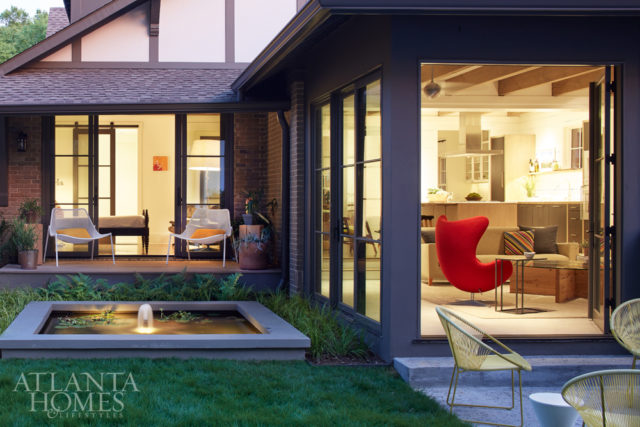They enlisted Chandler Hardscapes to install a koi pond that can be enjoyed from the master bedroom or sunroom. “After a long day of work, the koi pond provides you with a few moments of zen and knocks your blood pressure down pretty quickly,” says Dixon. The chairs are from Room & Board.