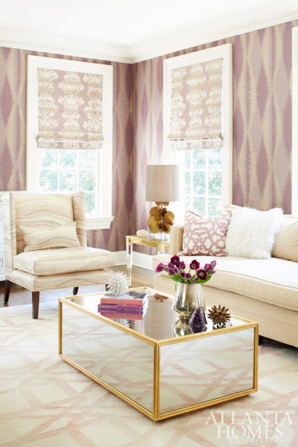 In lieu of heavy draperies in the living room, the homeowners opted for streamlined shades by Urban Decors in Jim Thompson’s Carmen fabric in lilac.