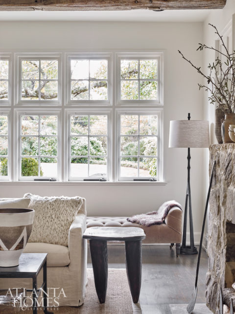 Because the house sits back from the street, and privacy was not a concern, the Weitzes opted to keep the windows bare, for a more European feel.