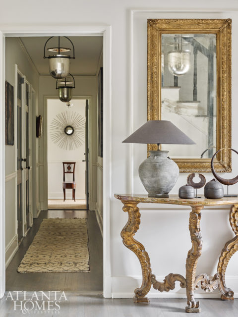 The entry foyer and hallway strike a lustrous, elegant note.