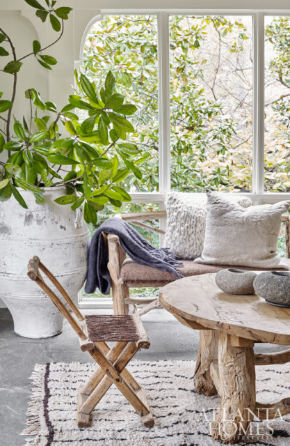It’s not just antiques but also pieces that conjure the effects of age that Debbie loves to collect the most, which is evident both inside and outside the sunroom.