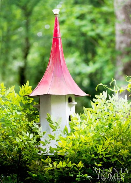 North Georgia artisan Tim Crane hand-crafted the quirky bird house, whose roof is fashioned from a repurposed victrola.