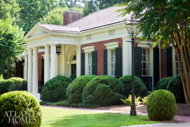 The neoclassical façade of this Lewis “Buck” Crook home sets the tone for interior details.