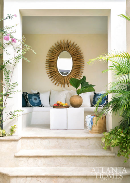 A mirror from Bungalow Classic takes center stage in the pool cabana.