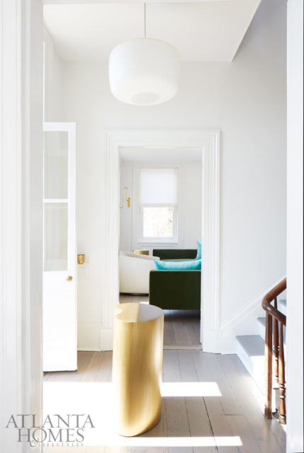 The classic Charleston layout is apparent upon stepping inside Jim and Kay Douglass’ new coastal refuge, which might be one of the many reasons why they like to head to their Holy City home at least once a month. The curvaceous brass occasional table accenting the third-floor foyer is from Holland & Company.
