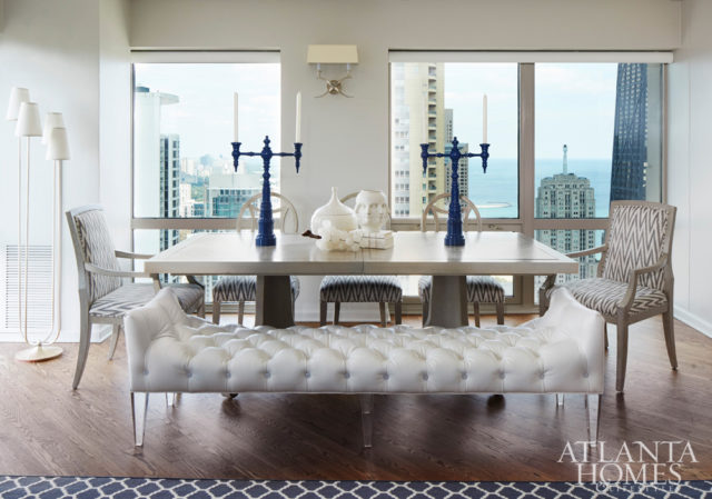 An extra-wide leather bench allows ample guest seating and reduces visual clutter.