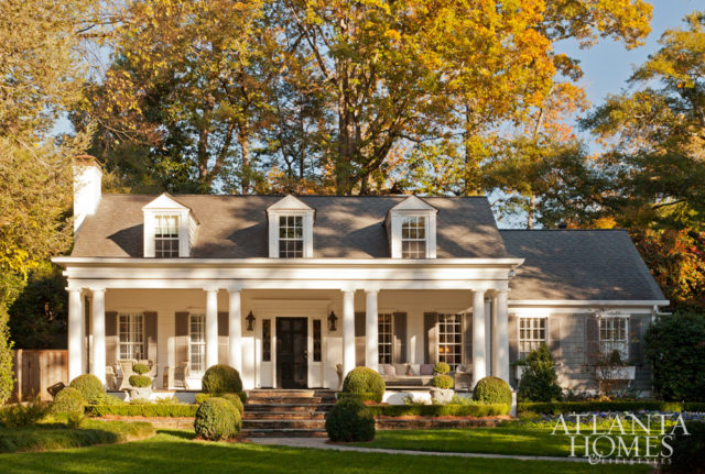 William B. Litchfield and Jackye Lanham refreshed this 1938 Colonial Revival cottage with a light palette and period-appropriate architectural details inside to “charm the house up,” says Litchfield.