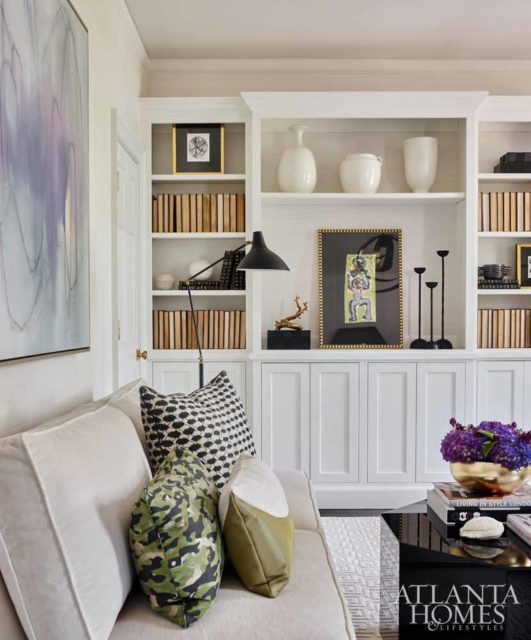 Formerly a bedroom leading to the service stair and maid’s quarters, architect Yong Pak reimagined this room as a second-floor living space. Ladisic Fine Homes upped the sophistication level by adding a built-in and opening it up to another upstairs bedroom via a Jack-and-Jill bathroom.