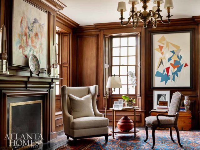 James Means, this house’s original architect, incorporated many reclaimed materials into this project, including the intricate reclaimed heart pine paneling featured in this formal living room. Coupled with the front facade’s deep window insets, the effect is classic sophistication.