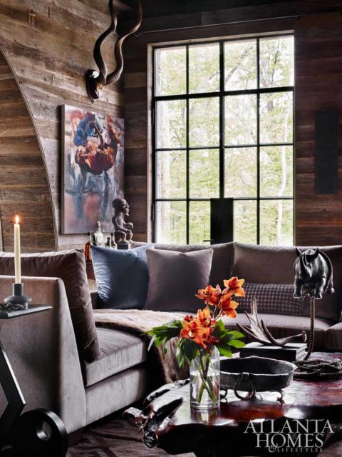 Architect Yong Pak and builder Michael Ladisic officially outdid themselves with this lofty man cave, which boasts plenty of natural light and views of Nancy Creek below. Employing reclaimed barn board from a rural property owned by the homeowners, and coupled with arched ceilings and steel-framed doors, its rustic-meets-elegant effect is nothing short of surprising at every turn.