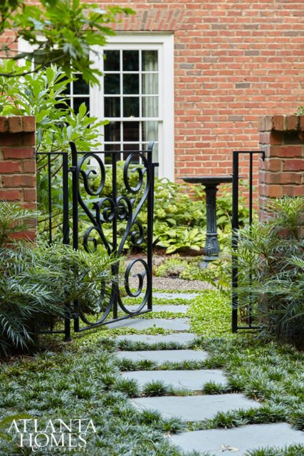 Cradled by a Boston ivy-clad brick wall, the pool surround strikes a balance between the simple and the formal. Thanks to valiant efforts by Duffey, Childers and landscape architect Alex Smith to alter the rear courtyard and hardscapes (including the addition of an octagonal porch), the pool and outdoor living spaces now relate to both each other and the house naturally and seamlessly.