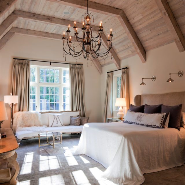 A timber-vaulted master bedroom serves as a luxurious retreat. Image courtesy of Images Publishing
