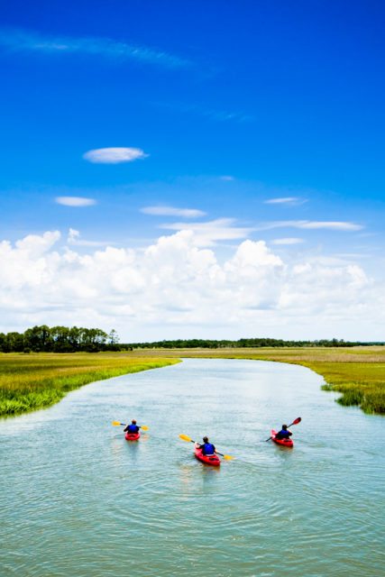 Kayaking tours on the island’s sprawling marshes are among the many options of outdoor adventures.