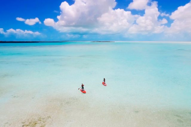 Paddleboarding at Caicos Bank is among the many on-island activities.