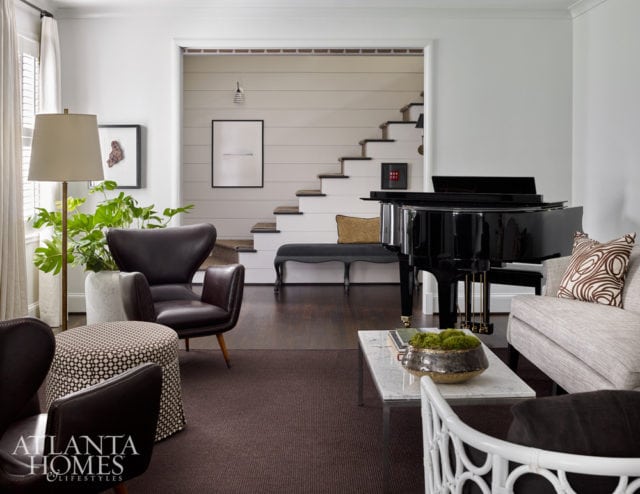 The gracious living room is a symphony of dark and light.