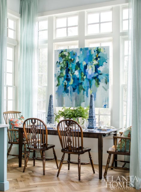 FLOATING ARTWORK Art mounted on built-ins or window frames is an unexpected element. Design by Jena Salmon