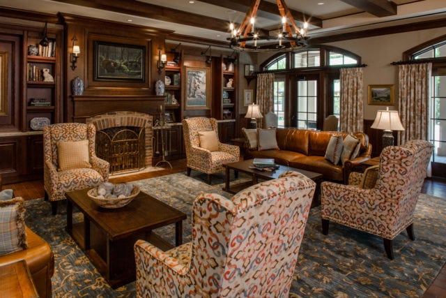 Cozy sitting areas surround a fireplace in the ground-floor living room of the Inn at Barnsley Resort.