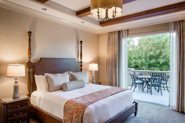 A Queen’s Suite at the Inn features a spacious terrace overlooking the resort’s lush, natural landscape.