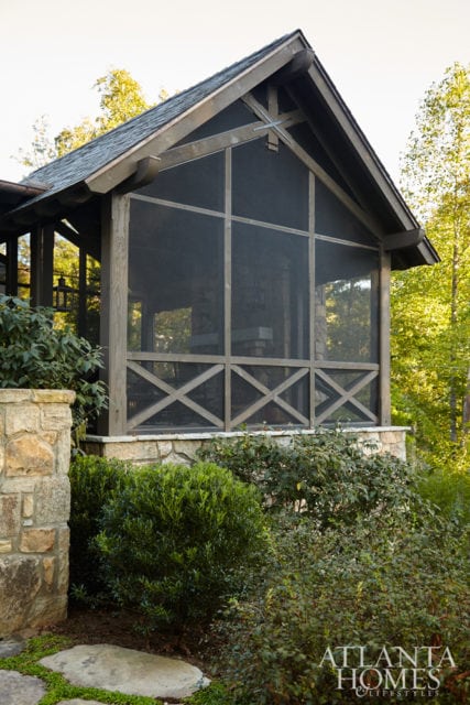 A screened porch is a cozy landing spot year-round, and offers lake views.