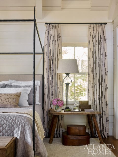 Westbrook aimed for a lighter and brighter feel in the master bedroom while also abiding by her design philosophy that “bedrooms should always feel a bit more elegant than the rest of the home.” She achieved this with delicate accents and antique pieces. The bed is Kerry Joyce through Ainsworth-Noah.