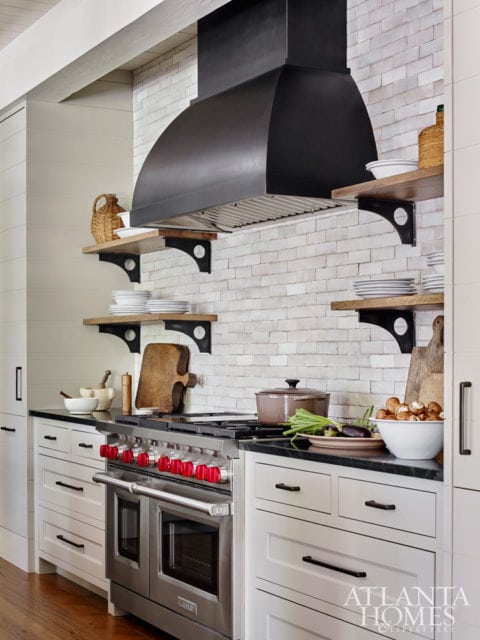 A handmade Moroccan tile backsplash creates a stunning focal point in the kitchen.
