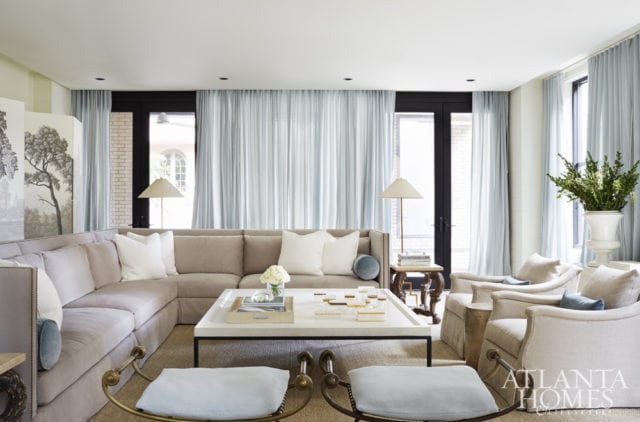 Entertaining company in the living room is a snap with plenty of seating options. The screen is by Penshaw Hill and the floor lamps are Circa Lighting.