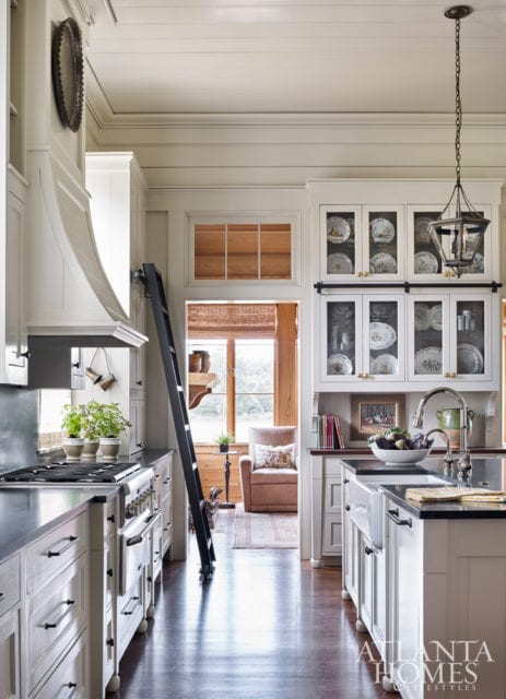 While the rooms feature some degree of separation similar to older homes, carefully conceived visual sightlines—like the kitchen to den—create flow.