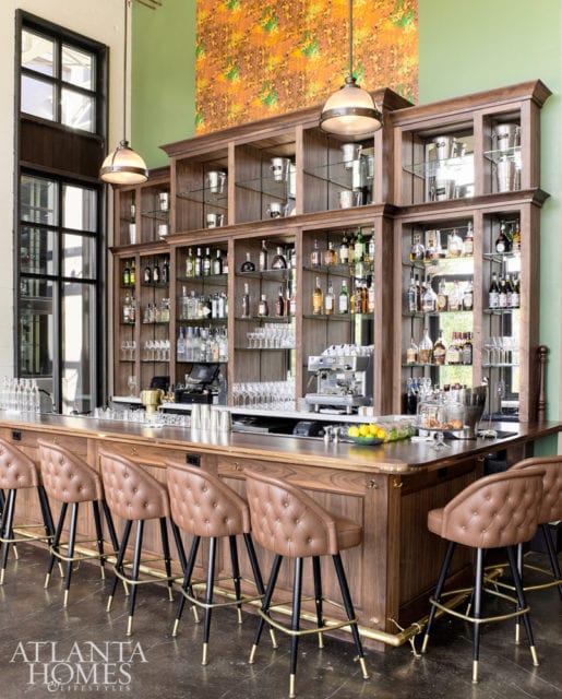 Bazati’s loor-to-ceiling windows and 23-foot ceilings create an open, breezy feel.