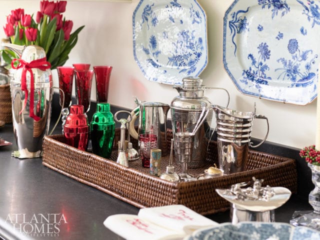 The martini shaker collection includes an art deco-style penguin by Napier, as well as festive red and green shakers.