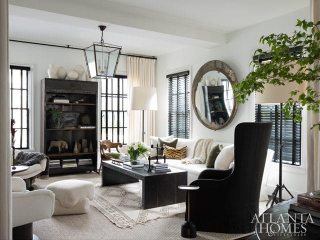 Interior designer Susan Ferrier, a confidante, suggested a 10-foot-long sofa, and Hughes subsequently selected Seine by Dmitriy & Co. The wing chair is Gregorius Pineo through Jerry Pair. The coffee table is Jean de Merry.