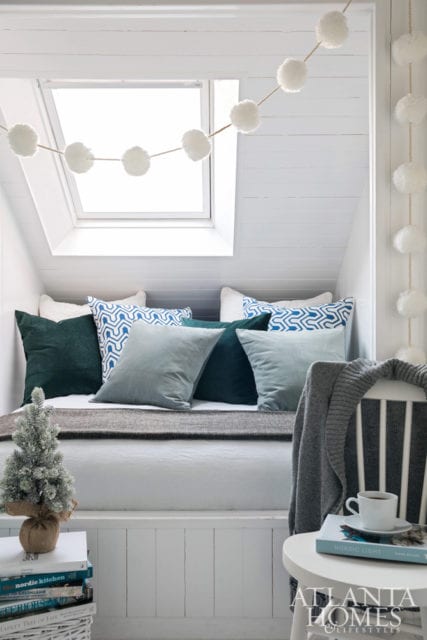 Flynn’s Icelandic guide-turned-contractor, Árni Hallgrímsson, transformed wasted space into a full-fledged sleeping nook for guests with a full-size mattress framed in and clad with glossy white tongue-and-groove pine; on perfectly clear nights, guests can experience the Northern Lights through the room’s skylight.