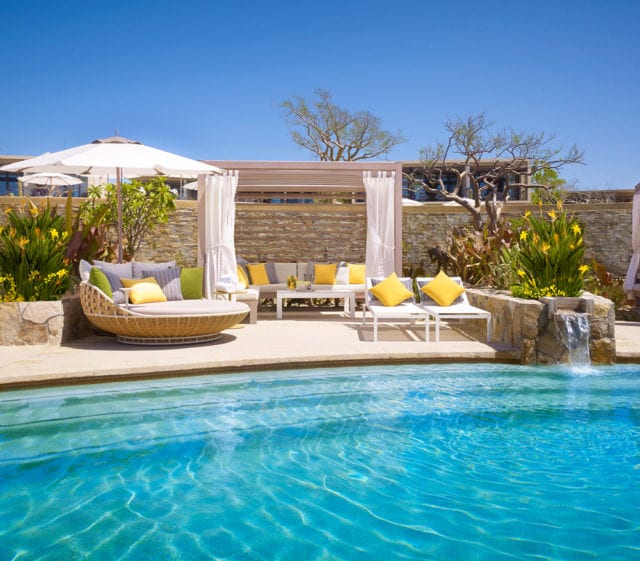Private poolside cabanas are designed for relaxation.