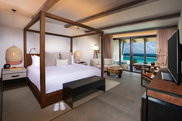 Guest suites showcase organic materials and local artwork.