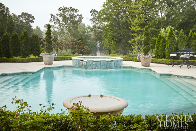 The boxwood hedge around the pool, which the client requested, enhances the pool complex and the garden.