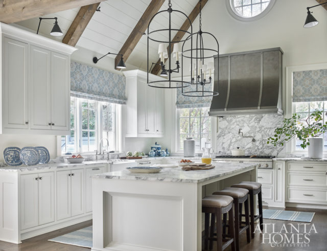 The pewter-clad vent hood from Francois & Co. provided the jumping-off point for the kitchen.