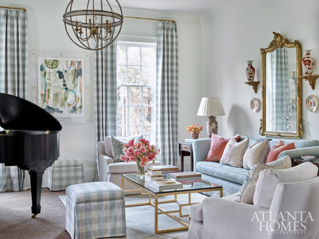 “While Jane has a vast collection of blue-and-white porcelain, she also had plenty of Imari, so we pulled the salmon hue from that porcelain to mix in with the blue and white color scheme,” says interior designer Lauren DeLoach. “Jane and I both love checks, so they are sprinkled throughout the rooms.”