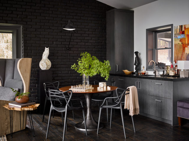 Refrigeration drawers, a wine cooler and bar sink by the front entrance make crafting drinks a cinch for guests who arrive in time for cocktail hour.