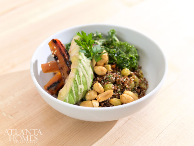 The quinoa bowl comes with kale, avocado, roasted carrot and a peanut vinaigrette.