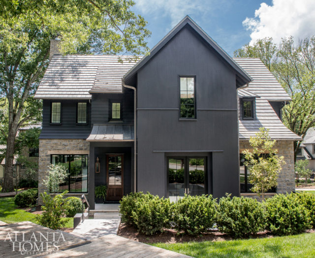 Designed by architect Carson Looney, the residence’s exterior is painted entirely black.
