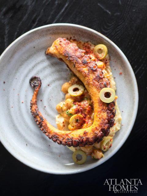 Pulpo a la Plancha blends cast iron-seared octopus, sobrassada sausage, chickpea and olive.