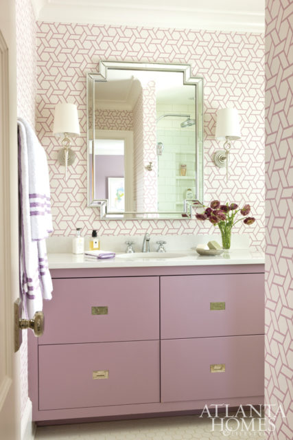 In a teenage girl’s bedroom suite, a scheme of lavender, cream and green will stand the test of time. A headboard upholstered in custom Galbraith & Paul colorway (through R. Hughes), bedding from Serena & Lily and table lamps from Bungalow 5 strike a playful chord.