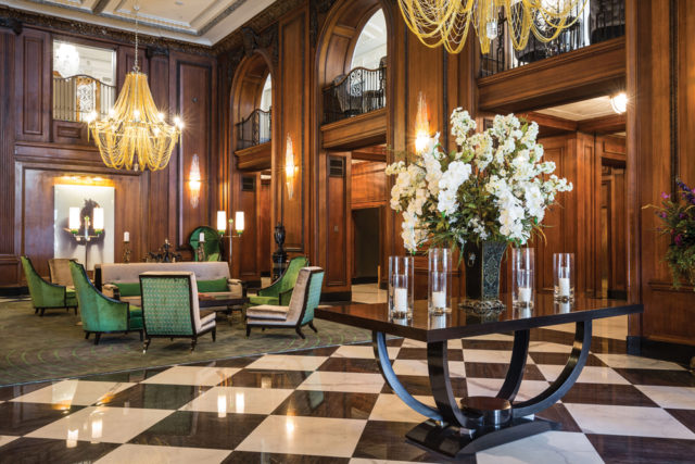 The hotel’s warm-but-opulent lobby appears both vintage 1920s and modern at once.
