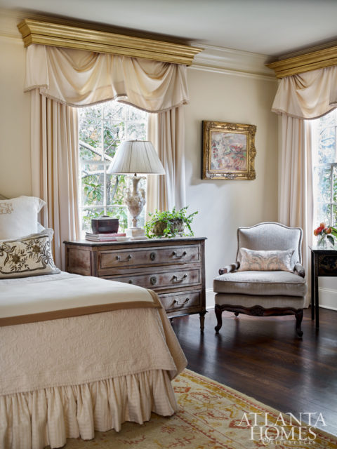 New gilt cornices in the master bedroom offer a regal touch.