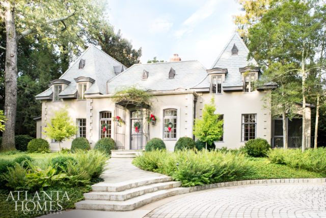 Matching dormers add charm to the front façade. The residence was renovated in 1996 by architect Keith Summerour.