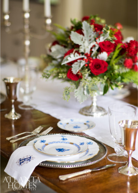 The dining room is holiday party-ready with silver goblets from Beverly Bremer Silver Shop and Herend’s Chinese Bouquet in blue available through Neiman Marcus.