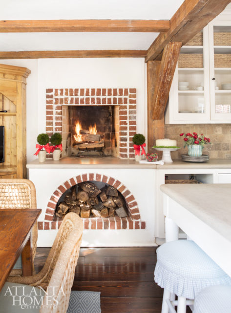 The original kitchen includes an unusual countertop fireplace.